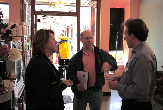 Nancy Stovall and Tom Carrollo congratulate Portland Loo builder Greg Madden of Madden fabrication.
